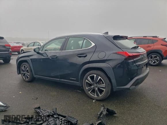 ✅ 2021 Lexus UX 250h • VIN: JTHP9JBH9M2038591 • Лот: 93892595. Опубликован ранее на Copart с пробегом 76 345 миль. Бесплатный доступ к архиву аукционных продаж из США и подробный отчёт об истории автомобиля на DreamBid. Изображение 2.