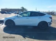 ✅ 2023 Tesla Model Y Long Range • VIN: 7SAYGDEE0PF945202 • Lot: 41611762. Listed on IAAI with 7,316 mi. Free auction sales archive from the USA and detailed vehicle history report at DreamBid. Image 14.