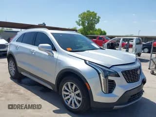 ✅ 2021 Cadillac XT4 FWD Premium Luxury • VIN: 1GYFZCR43MF084707 • Лот: 42883874. Опубликован ранее на IAAI с пробегом 54 356 миль. Бесплатный доступ к архиву аукционных продаж из США и подробный отчёт об истории автомобиля на DreamBid. Изображение 1.