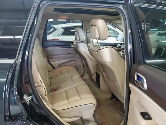 ✅ 2014 Jeep Grand Cherokee Overland • VIN: 1C4RJFCM1EC329575 • Lot: 67858565. Listed on Copart with 124,555 mi. Free auction sales archive from the USA and detailed vehicle history report at DreamBid. Image 11.