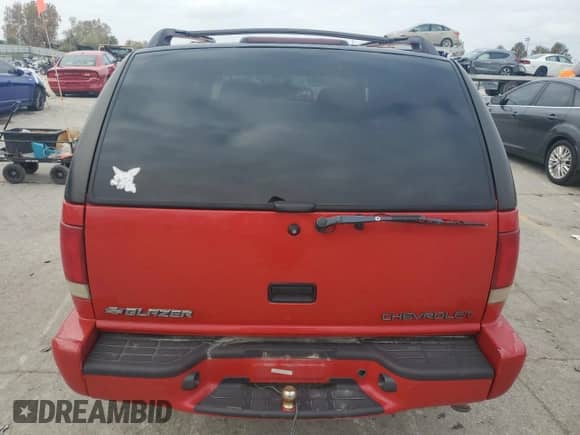 2000 Chevrolet Blazer LS with VIN 1GNDT13W1Y2343101, listed as a Copart auction lot 79671824 with 183,382 mi miles and Salvage title. Bid and sale history available at DreamBid. Image 6.