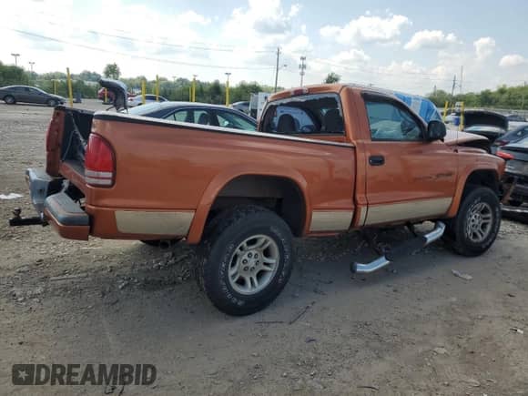 2001 Dodge Dakota Sport z VIN 1B7GG26N31S197440, wystawiony jako Copart lot #68280665 z przebiegiem Nie podano mil oraz Szkoda całkowita • Salvage title. Historia ofert i sprzedaży dostępna na DreamBid. Obrazek 3.