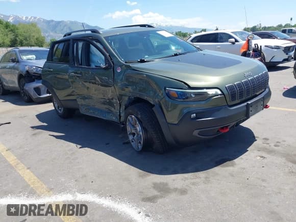 ✅ 2021 Jeep Cherokee Trailhawk • VIN: 1C4PJMBX9MD142777 • Lot: 42363454. Listed on IAAI with 47,004 mi. Free auction sales archive from the USA and detailed vehicle history report at DreamBid. Image 1.