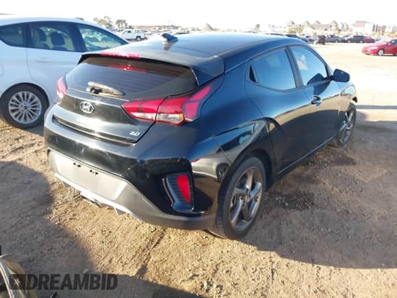 2019 Hyundai Veloster Premium with VIN KMHTG6AF5KU013252, listed as a IAAI auction lot 41313753 with 63,323 mi miles and . Bid and sale history available at DreamBid. Image 4.