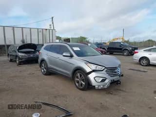 2016 Hyundai Santa Fe Limited z VIN KM8SRDHF2GU132156, wystawiony jako IAAI lot #43386975 z przebiegiem 143 464 mil mil oraz . Historia ofert i sprzedaży dostępna na DreamBid. Obrazek 1.