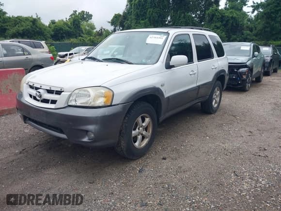 ✅ 2005 Mazda Tribute i • VIN: 4F2YZ92Z75KM42150 • Lot: 42703391. Listed on IAAI with 187,595 mi. Free auction sales archive from the USA and detailed vehicle history report at DreamBid. Image 2.