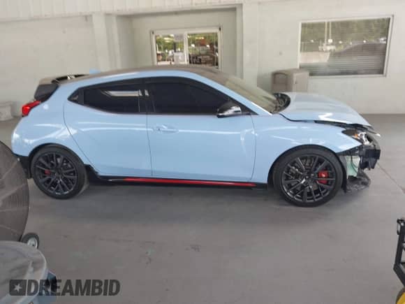 2020 Hyundai Veloster z VIN KMHT36AH1LU004224, wystawiony jako IAAI lot #42292567 z przebiegiem 74 725 mil mil oraz . Historia ofert i sprzedaży dostępna na DreamBid. Obrazek 14.