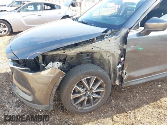 ✅ 2017 Mazda CX-5 Grand Touring • VIN: JM3KFBDL2H0151481 • Лот: 43452984. Опубликован ранее на IAAI с пробегом 119 413 миль. Бесплатный доступ к архиву аукционных продаж из США и подробный отчёт об истории автомобиля на DreamBid. Изображение 6.