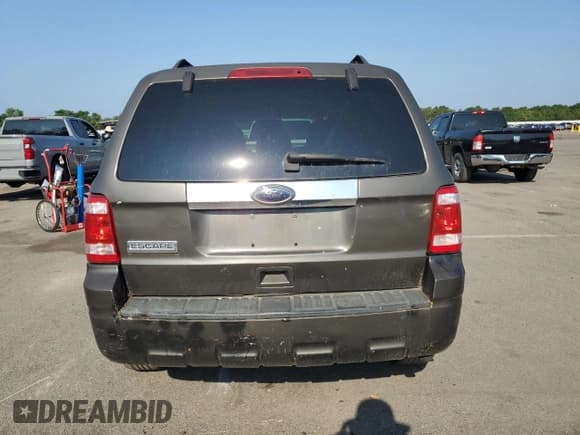 ✅ 2011 Ford Escape Hybrid • VIN: 1FMCU4K35BKA16469 • Lot: 65811905. Listed on Copart with 401,583 mi. Free auction sales archive from the USA and detailed vehicle history report at DreamBid. Image 6.