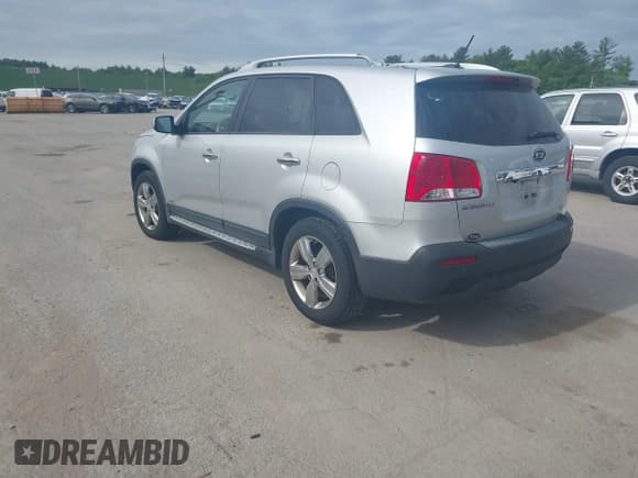 ✅ 2012 Kia Sorento EX • VIN: 5XYKUDA21CG235090 • Lot: 42386362. Listed on IAAI with 163,595 mi. Free auction sales archive from the USA and detailed vehicle history report at DreamBid. Image 3.