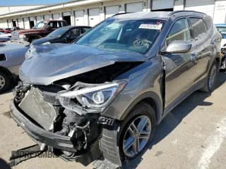 ✅ 2018 Hyundai Santa Fe 2.4L • VIN: 5NMZUDLB5JH073608 • Лот: 61243292. Опубликован ранее на Copart с пробегом 43 386 миль. Бесплатный доступ к архиву аукционных продаж из США и подробный отчёт об истории автомобиля на DreamBid. Изображение 2.