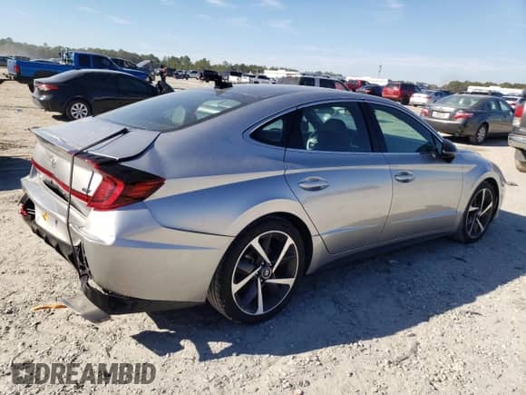 2022 Hyundai Sonata Sport z VIN 5NPEJ4J25NH140145, wystawiony jako Copart lot #87569595 z przebiegiem 26 203 mil mil oraz Szkoda całkowita • Salvage title. Historia ofert i sprzedaży dostępna na DreamBid. Obrazek 3.