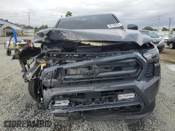 ✅ 2025 Toyota Tacoma SR5 • VIN: 3TMLB5JN9SM125531 • Лот: 86140655. Опубликован ранее на Copart с пробегом 6 018 миль. Бесплатный доступ к архиву аукционных продаж из США и подробный отчёт об истории автомобиля на DreamBid. Изображение 5.