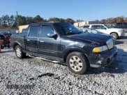 ✅ 2002 Lincoln Blackwood • VIN: 5LTEW05A62KJ01604 • Lot: 82604734. Listed on Copart with 112,312 mi. Free auction sales archive from the USA and detailed vehicle history report at DreamBid. Image 4.