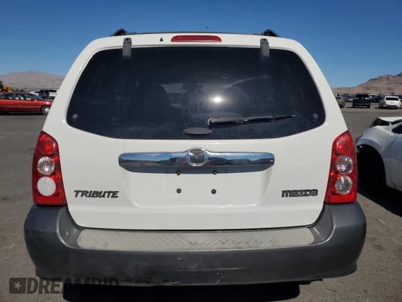 ✅ 2005 Mazda Tribute S • VIN: 4F2CZ04125KM40447 • Lot: 85744955. Listed on Copart with 233,795 mi. Free auction sales archive from the USA and detailed vehicle history report at DreamBid. Image 6.