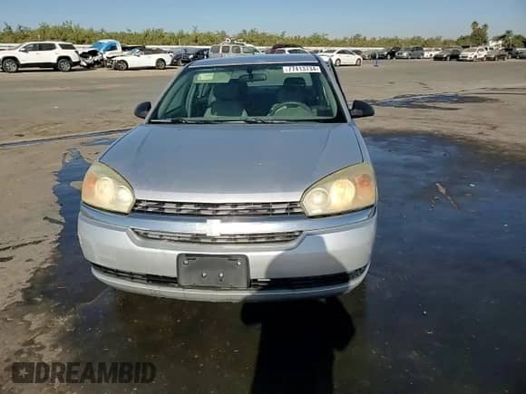 2004 Chevrolet Malibu z VIN 1G1ZS52FX4F246422, wystawiony jako Copart lot #77413734 z przebiegiem 248 445 mil mil oraz Szkoda całkowita • Salvage title. Historia ofert i sprzedaży dostępna na DreamBid. Obrazek 11.