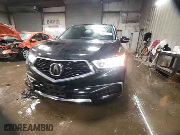 ✅ 2018 Acura MDX Technology • VIN: 5J8YD4H79JL005683 • Лот: 84438674. Опубликован ранее на Copart с пробегом 60 181 миль. Бесплатный доступ к архиву аукционных продаж из США и подробный отчёт об истории автомобиля на DreamBid. Изображение 14.