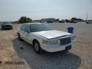 ✅ 1997 Lincoln Town Car Signature • VIN: 1LNLM82W9VY681894 • Lot: 71467034. Listed on Copart with 129,142 mi. Free auction sales archive from the USA and detailed vehicle history report at DreamBid. Image 11.