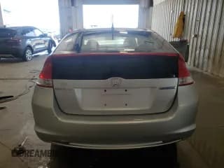 ✅ 2010 Honda Insight EX • VIN: JHMZE2H70AS022459 • Lot: 64527205. Wystawiony na Copart z przebiegiem 211 849 mil. Bezpłatny archiwum sprzedaży aukcyjnych z USA i szczegółowy raport historii pojazdu na DreamBid. Zdjęcie 6.