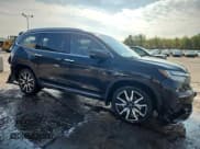 ✅ 2019 Honda Pilot Touring 7-Passenger • VIN: 5FNYF6H69KB092985 • Lot: 69071955. Listed on Copart with 128,915 mi. Free auction sales archive from the USA and detailed vehicle history report at DreamBid. Image 4.