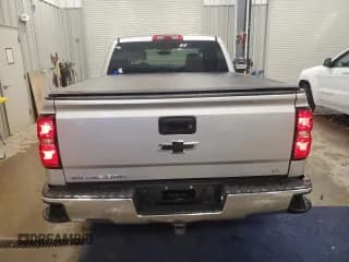 ✅ 2018 Chevrolet Silverado 1500 LT • VIN: 3GCUKRECXJG534137 • Лот: 84789175. Опубликован ранее на Copart с пробегом 93 814 миль. Бесплатный доступ к архиву аукционных продаж из США и подробный отчёт об истории автомобиля на DreamBid. Изображение 6.