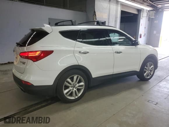 ✅ 2016 Hyundai Santa Fe • VIN: 5XYZW4LAXGG312798 • Лот: 61429815. Опубликован ранее на Copart с пробегом 86 932 миль. Бесплатный доступ к архиву аукционных продаж из США и подробный отчёт об истории автомобиля на DreamBid. Изображение 3.