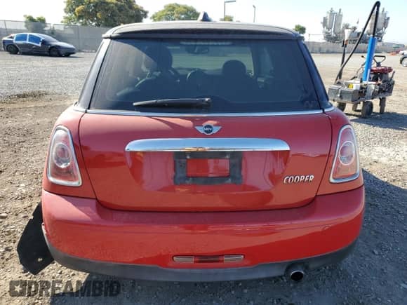2011 MINI Hardtop with VIN WMWSU3C58BT183765, listed as a Copart auction lot 63061405 with 59,902 mi miles and Salvage title. Bid and sale history available at DreamBid. Image 6.