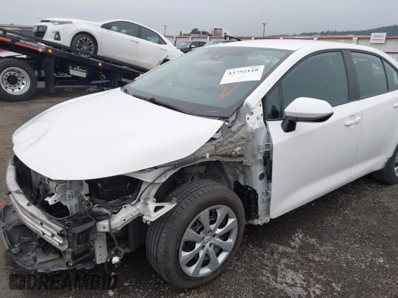 ✅ 2021 Toyota Corolla LE • VIN: 5YFEPMAE4MP210096 • Lot: 43752118. Listed on IAAI with 77,224 mi. Free auction sales archive from the USA and detailed vehicle history report at DreamBid. Image 18.