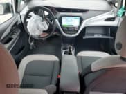 ✅ 2020 Chevrolet Bolt EV LT • VIN: 1G1FY6S03L4142139 • Лот: 79652944. Опубликован ранее на Copart с пробегом 28 073 миль. Бесплатный доступ к архиву аукционных продаж из США и подробный отчёт об истории автомобиля на DreamBid. Изображение 8.