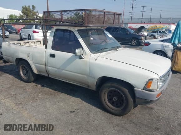 ✅ 1990 Toyota Pickup • VIN: JT4RN81AXL5064262 • Lot: 42987835. Listed on IAAI with 210,998 mi. Free auction sales archive from the USA and detailed vehicle history report at DreamBid. Image 1.