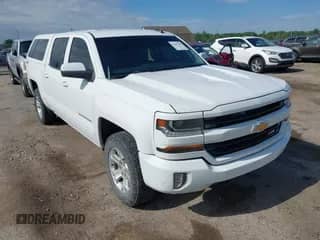 2016 Chevrolet Silverado 1500 LT z VIN 3GCUKRECXGG291194, wystawiony jako IAAI lot #42397738 z przebiegiem 185 764 mil mil oraz . Historia ofert i sprzedaży dostępna na DreamBid. Obrazek 1.