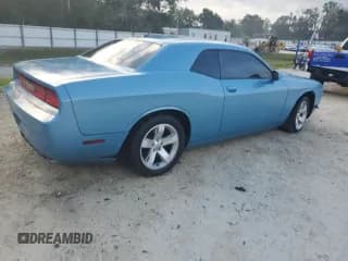 ✅ 2012 Dodge Challenger SXT Plus • VIN: 2C3CDYAG7CH100693 • Lot: 84772665. Wystawiony na Copart z przebiegiem 129 067 mil. Bezpłatny archiwum sprzedaży aukcyjnych z USA i szczegółowy raport historii pojazdu na DreamBid. Zdjęcie 3.