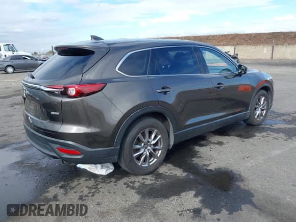 ✅ 2018 Mazda CX-9 Touring • VIN: JM3TCBCY4J0209056 • Lot: 43443194. Listed on IAAI with 70,290 mi. Free auction sales archive from the USA and detailed vehicle history report at DreamBid. Image 4.