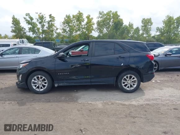✅ 2020 Chevrolet Equinox LS • VIN: 2GNAXSEV2L6257518 • Lot: 43151684. Listed on IAAI with 145,700 mi. Free auction sales archive from the USA and detailed vehicle history report at DreamBid. Image 14.