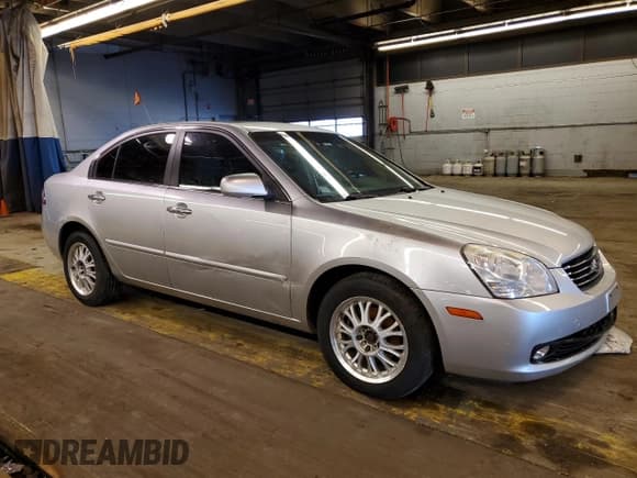 ✅ 2007 Kia Optima LX • VIN: KNAGE123475109066 • Lot: 41294354. Wystawiony na Copart z przebiegiem 134 888 mil. Bezpłatny archiwum sprzedaży aukcyjnych z USA i szczegółowy raport historii pojazdu na DreamBid. Zdjęcie 4.