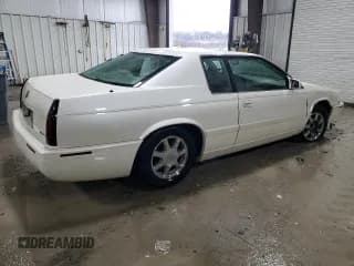✅ 2001 Cadillac Eldorado Touring ETC • VIN: 1G6ET12981B108521 • Лот: 84194674. Опубликован ранее на Copart с пробегом Не указан. Бесплатный доступ к архиву аукционных продаж из США и подробный отчёт об истории автомобиля на DreamBid. Изображение 3.