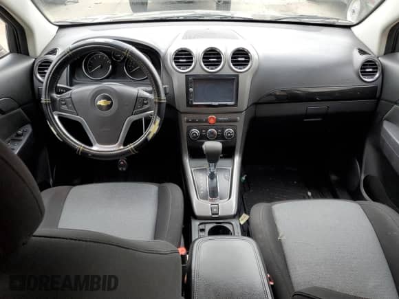 2014 Chevrolet Captiva Sport LT с VIN 3GNAL3EK5ES517941, выставлен на аукционе Copart как лот 82647754 с пробегом 142 020 миль миль и Списание • Salvage title. История ставок и продаж доступна на DreamBid. Изображение 8.