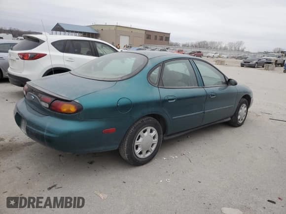 ✅ 1997 Ford Taurus G • VIN: 1FALP51U2VG299048 • Lot: 85742504. Wystawiony na Copart z przebiegiem 123 356 mil. Bezpłatny archiwum sprzedaży aukcyjnych z USA i szczegółowy raport historii pojazdu na DreamBid. Zdjęcie 3.