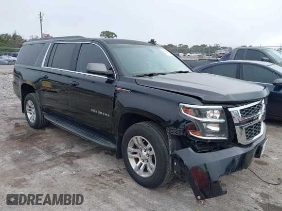 ✅ 2017 Chevrolet Suburban LS • VIN: 1GNSCGKC4HR289284 • Lot: 41503869. Listed on IAAI with 92,048 mi. Free auction sales archive from the USA and detailed vehicle history report at DreamBid. Image 1.