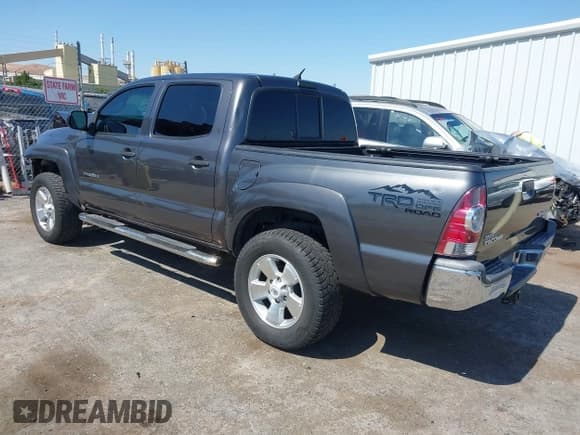 ✅ 2013 Toyota Tacoma PreRunner • VIN: 5TFJX4GN9DX021354 • Lot: 42674262. Listed on IAAI with 122,601 mi. Free auction sales archive from the USA and detailed vehicle history report at DreamBid. Image 3.