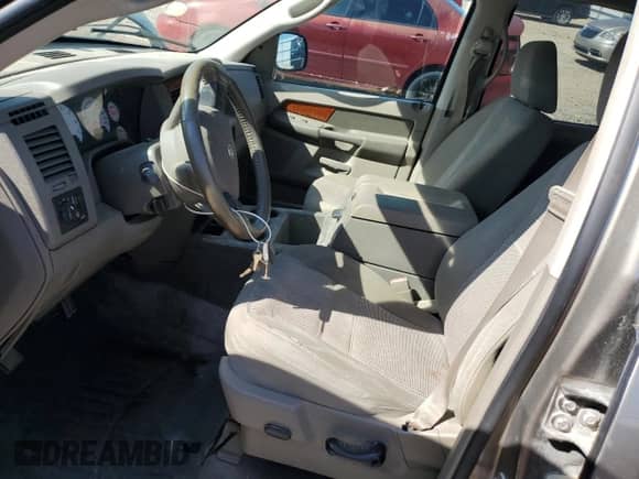 2006 Dodge 1500 Laramie z VIN 1D7HU182X6S677529, wystawiony jako Copart lot #65749695 z przebiegiem 193 955 mil mil oraz Szkoda całkowita • Salvage title. Historia ofert i sprzedaży dostępna na DreamBid. Obrazek 7.