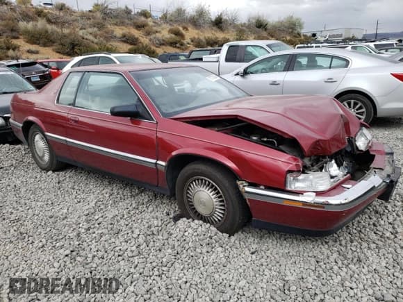 ✅ 1992 Cadillac Eldorado • VIN: 1G6EL13B2NU618200 • Lot: 71774244. Listed on Copart with 114,202 mi. Free auction sales archive from the USA and detailed vehicle history report at DreamBid. Image 4.