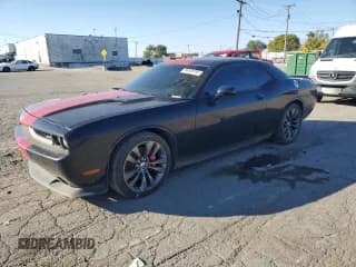✅ 2013 Dodge Challenger SRT-8 • VIN: 2C3CDYCJ9DH668163 • Lot: 86838185. Listed on Copart with 94,723 mi. Free auction sales archive from the USA and detailed vehicle history report at DreamBid. Image 1.
