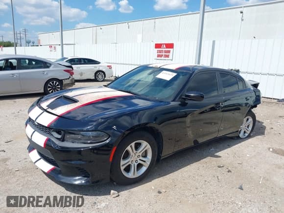 ✅ 2021 Dodge Charger SXT • VIN: 2C3CDXBG1MH632600 • Лот: 43312625. Опубликован ранее на IAAI с пробегом 82 940 миль. Бесплатный доступ к архиву аукционных продаж из США и подробный отчёт об истории автомобиля на DreamBid. Изображение 2.