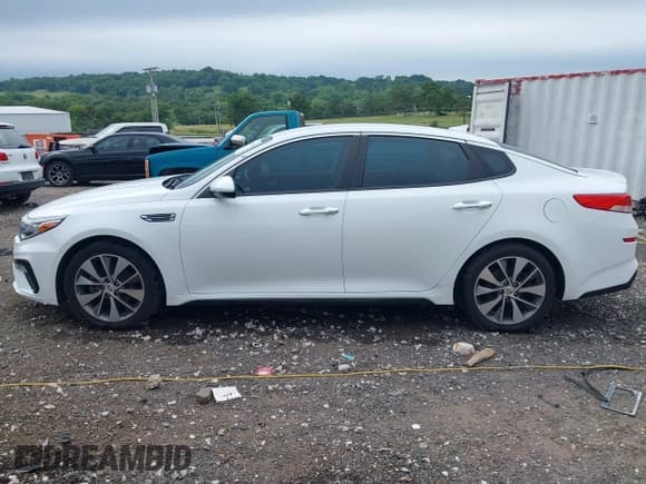 ✅ 2019 Kia Optima LX • VIN: 5XXGT4L31KG292990 • Lot: 42604118. Wystawiony na IAAI z przebiegiem 119 700 mil. Bezpłatny archiwum sprzedaży aukcyjnych z USA i szczegółowy raport historii pojazdu na DreamBid. Zdjęcie 14.