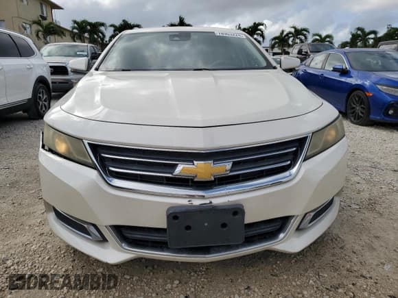 ✅ 2014 Chevrolet Impala LT • VIN: 2G1115SL4E9208457 • Лот: 78903224. Опубликован ранее на Copart с пробегом 174 546 миль. Бесплатный доступ к архиву аукционных продаж из США и подробный отчёт об истории автомобиля на DreamBid. Изображение 5.