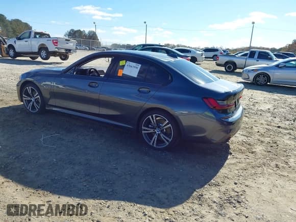 ✅ 2022 BMW 3 Series 330e • VIN: 3MW5P7J07N8C55523 • Lot: 43663590. Wystawiony na IAAI z przebiegiem 29 397 mil. Bezpłatny archiwum sprzedaży aukcyjnych z USA i szczegółowy raport historii pojazdu na DreamBid. Zdjęcie 3.