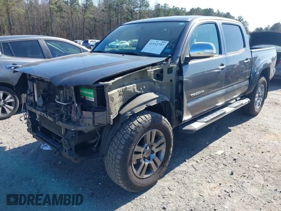 ✅ 2013 Toyota Tacoma PreRunner • VIN: 5TFJU4GN2DX031877 • Lot: 41532757. Listed on IAAI with 176,797 mi. Free auction sales archive from the USA and detailed vehicle history report at DreamBid. Image 2.