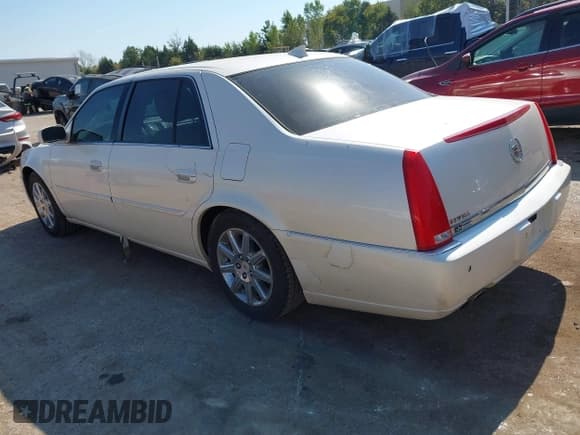 ✅ 2009 Cadillac DTS 1SA • VIN: 1G6KD57Y09U115406 • Lot: 43469527. Wystawiony na IAAI z przebiegiem 165 258 mil. Bezpłatny archiwum sprzedaży aukcyjnych z USA i szczegółowy raport historii pojazdu na DreamBid. Zdjęcie 3.