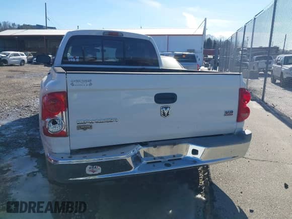 2005 Dodge Dakota Laramie with VIN 1D7HW58N35S189677, listed as a IAAI auction lot 41335613 with 159,501 mi miles and . Bid and sale history available at DreamBid. Image 16.